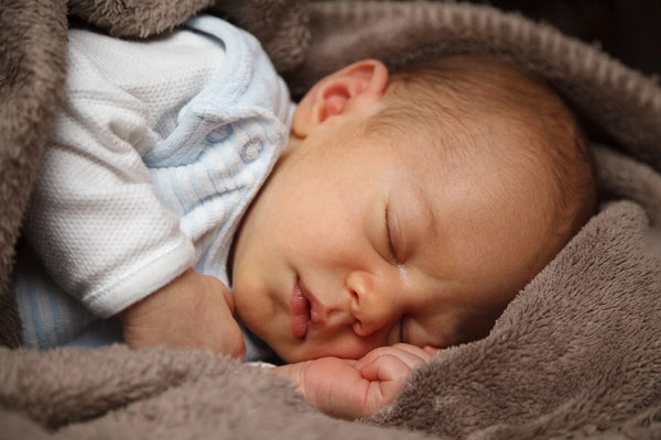 A 6 month old baby having a nice sleep